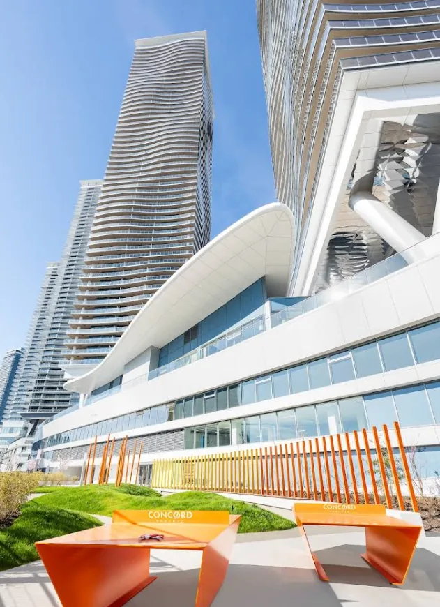 Concord Brentwood Hillside East 1 — architectural residential development by Concord Pacific featuring curvilinear facade and curtain wall systems